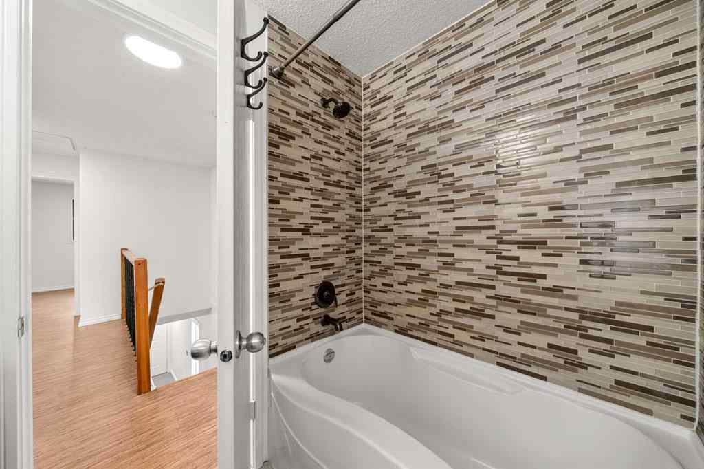 MLS® A2267618 - 150 Shawmeadows Road SW in Shawnessy Calgary, Residential