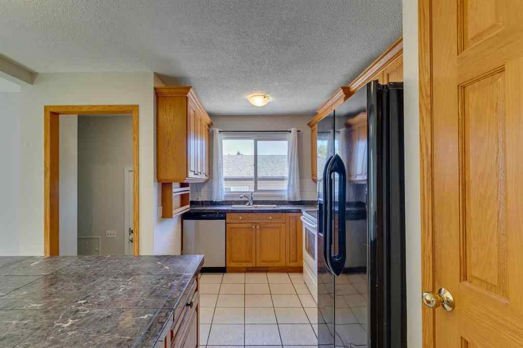 MLS® A2267622 - 2823 Dover Ridge Drive SE in Dover Calgary, Residential