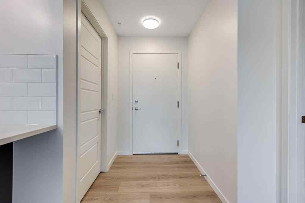 MLS® A2267635 - Unit #207 245 Edith Place NW in Glacier Ridge Calgary, Residential