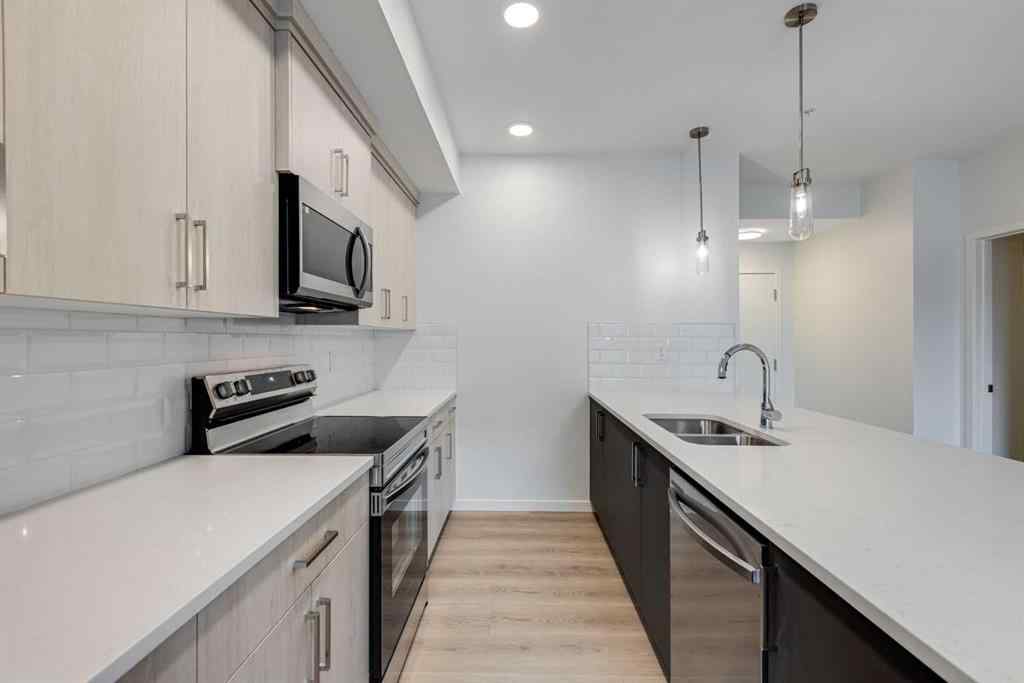 MLS® A2267635 - Unit #207 245 Edith Place NW in Glacier Ridge Calgary, Residential