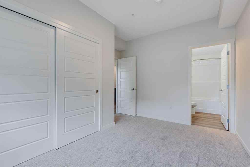 MLS® A2267635 - Unit #207 245 Edith Place NW in Glacier Ridge Calgary, Residential