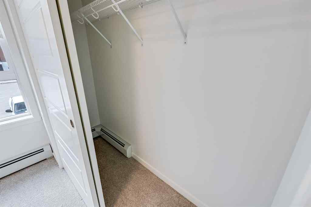 MLS® A2267635 - Unit #207 245 Edith Place NW in Glacier Ridge Calgary, Residential