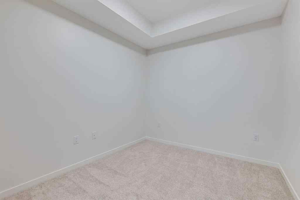 MLS® A2267635 - Unit #207 245 Edith Place NW in Glacier Ridge Calgary, Residential