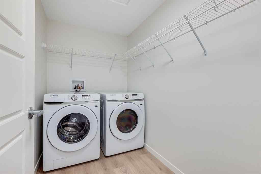 MLS® A2267635 - Unit #207 245 Edith Place NW in Glacier Ridge Calgary, Residential