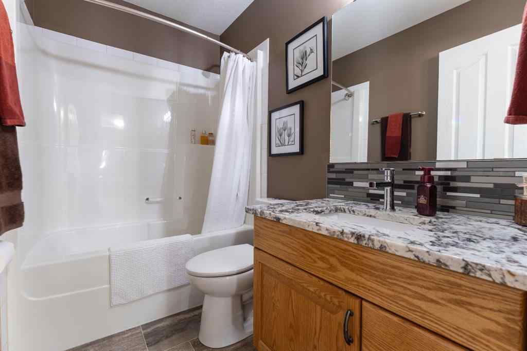 MLS® A2267638 - 14 Riviera Drive  in Regency Park Lacombe, Residential