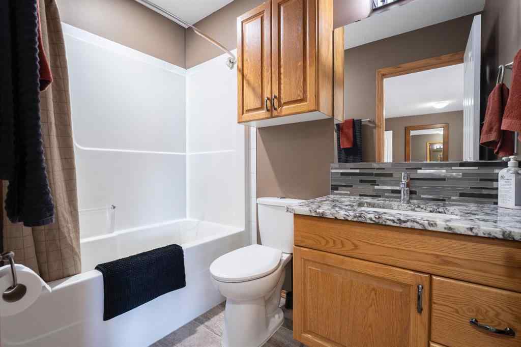 MLS® A2267638 - 14 Riviera Drive  in Regency Park Lacombe, Residential