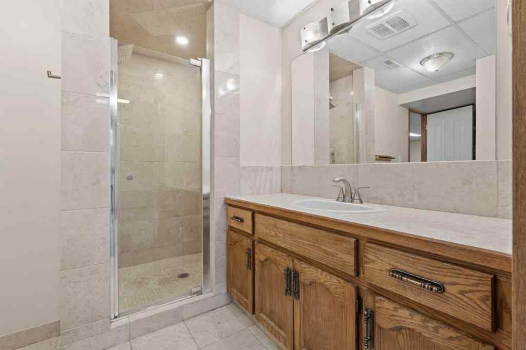 MLS® A2267646 - 667 Macewan Drive NW in MacEwan Glen Calgary, Residential