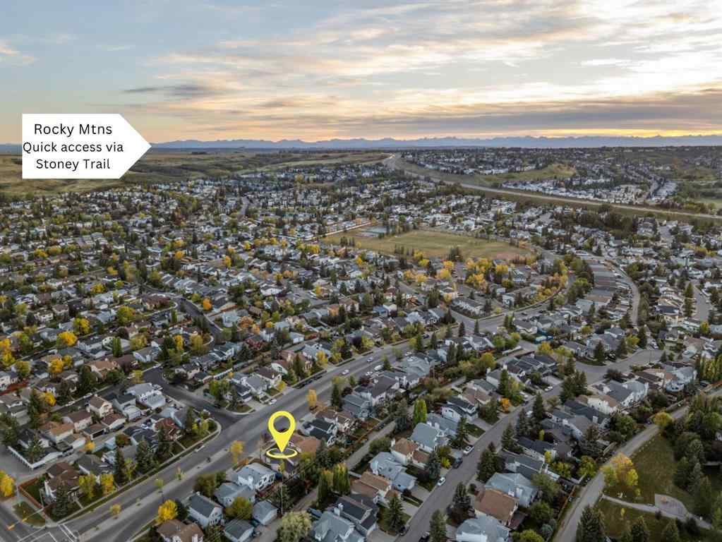 MLS® A2267646 - 667 Macewan Drive NW in MacEwan Glen Calgary, Residential