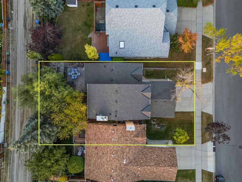 MLS® A2267646 - 667 Macewan Drive NW in MacEwan Glen Calgary, Residential