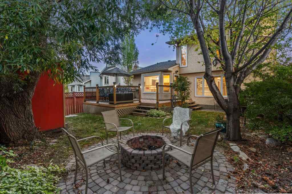 MLS® A2267646 - 667 Macewan Drive NW in MacEwan Glen Calgary, Residential