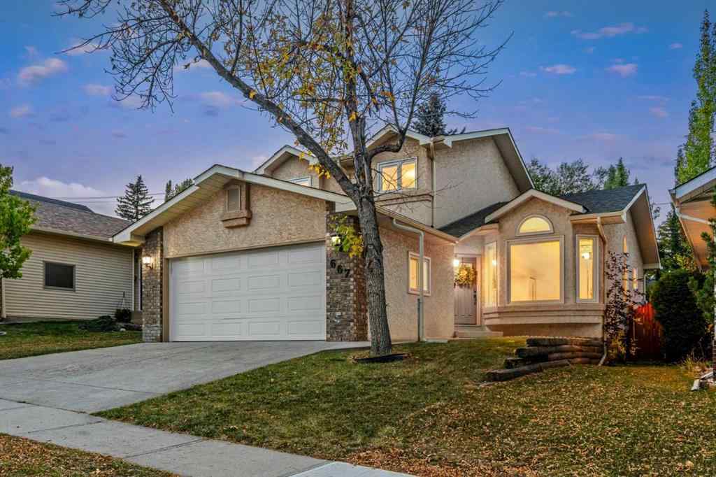 MLS® A2267646 - 667 Macewan Drive NW in MacEwan Glen Calgary, Residential