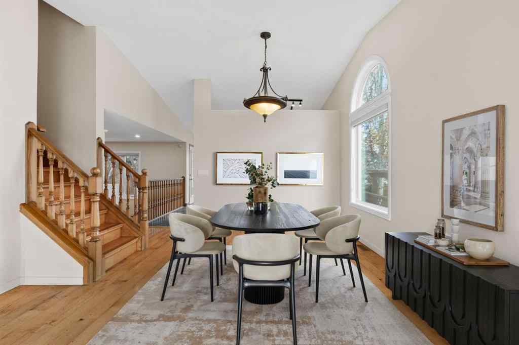 MLS® A2267646 - 667 Macewan Drive NW in MacEwan Glen Calgary, Residential