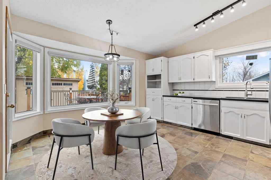MLS® A2267646 - 667 Macewan Drive NW in MacEwan Glen Calgary, Residential