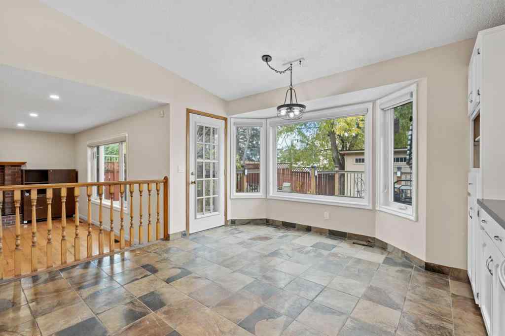 MLS® A2267646 - 667 Macewan Drive NW in MacEwan Glen Calgary, Residential