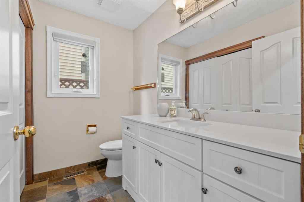 MLS® A2267646 - 667 Macewan Drive NW in MacEwan Glen Calgary, Residential