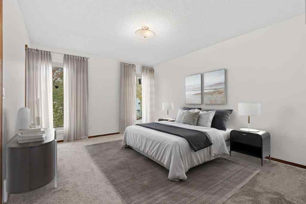MLS® A2267646 - 667 Macewan Drive NW in MacEwan Glen Calgary, Residential