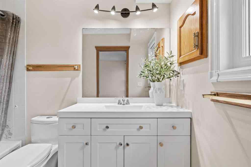 MLS® A2267646 - 667 Macewan Drive NW in MacEwan Glen Calgary, Residential