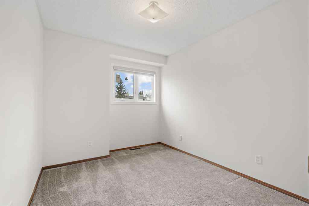 MLS® A2267646 - 667 Macewan Drive NW in MacEwan Glen Calgary, Residential