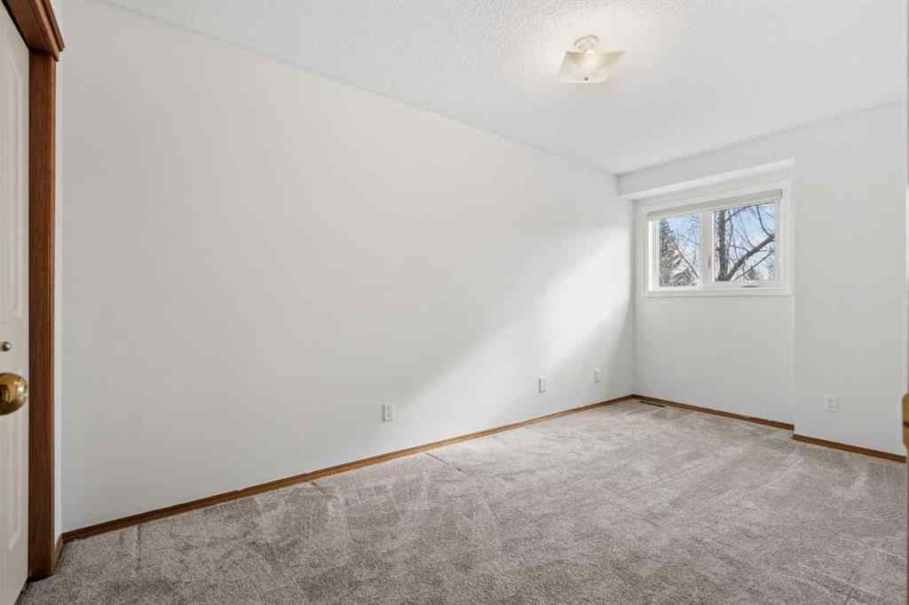 MLS® A2267646 - 667 Macewan Drive NW in MacEwan Glen Calgary, Residential