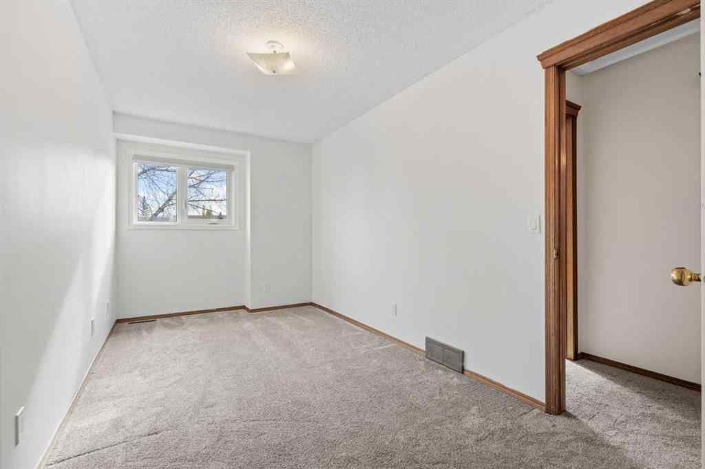 MLS® A2267646 - 667 Macewan Drive NW in MacEwan Glen Calgary, Residential