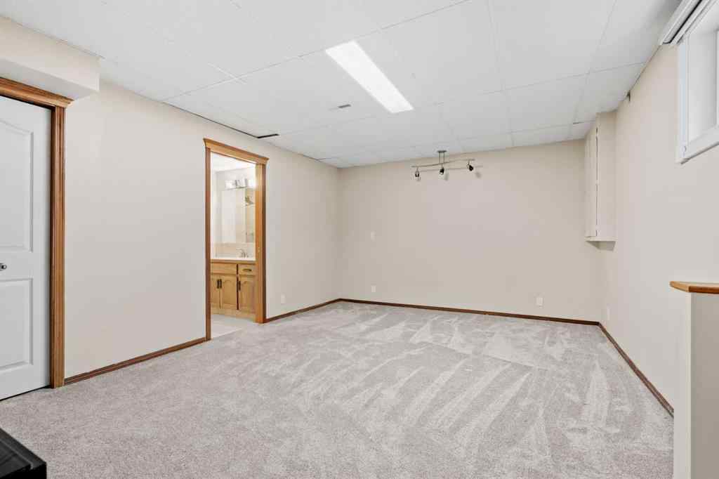 MLS® A2267646 - 667 Macewan Drive NW in MacEwan Glen Calgary, Residential