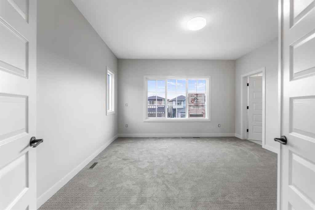 MLS® A2267659 - 292 Savanna Drive NE in Saddle Ridge Calgary, Residential