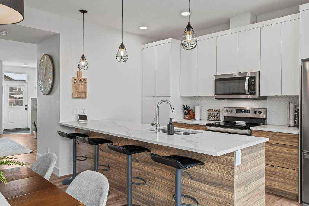 MLS® A2267685 - 216 Clydesdale Avenue  in Heartland Cochrane, Residential