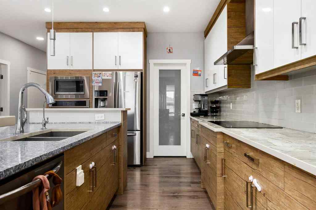 MLS® A2267686 - 106 Baysprings Gardens SW in Baysprings Airdrie, Residential