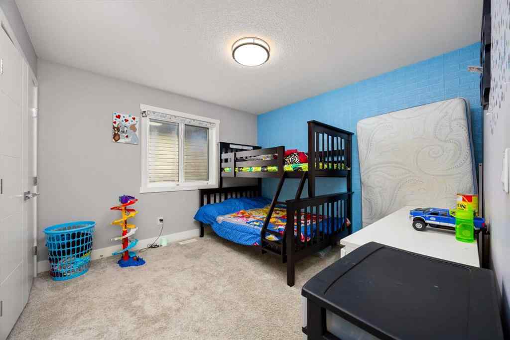 MLS® A2267686 - 106 Baysprings Gardens SW in Baysprings Airdrie, Residential