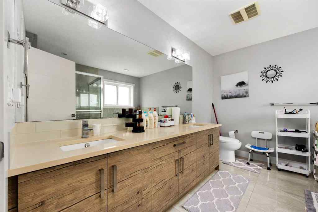 MLS® A2267686 - 106 Baysprings Gardens SW in Baysprings Airdrie, Residential