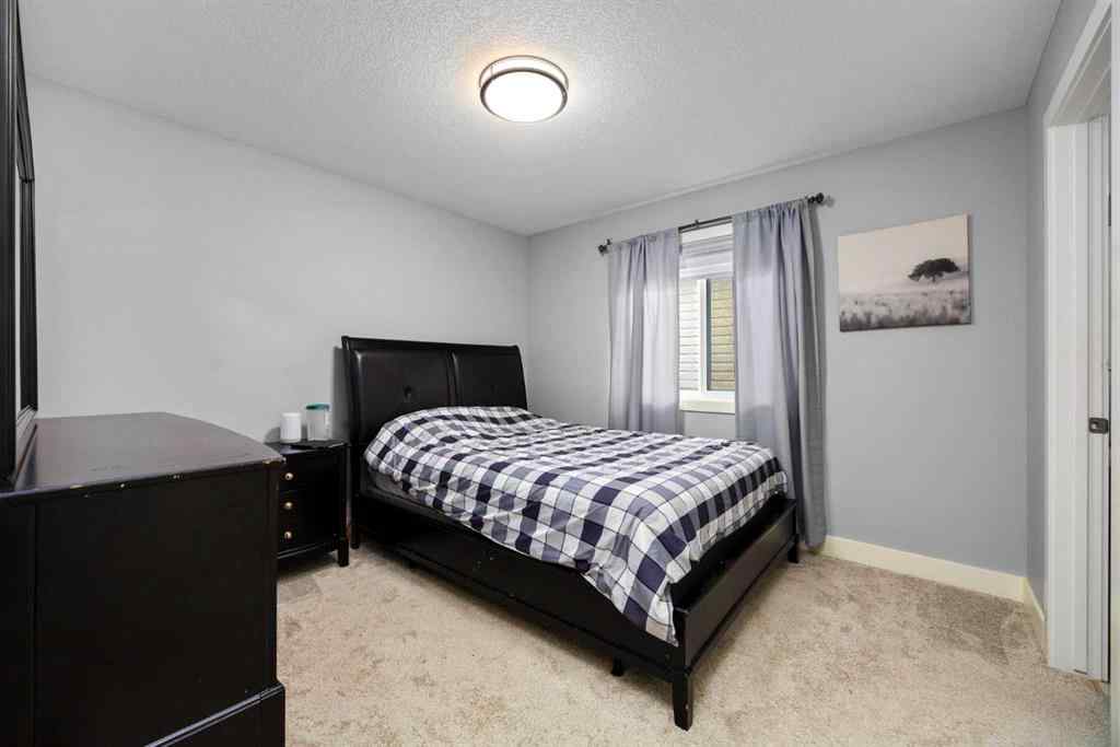 MLS® A2267686 - 106 Baysprings Gardens SW in Baysprings Airdrie, Residential