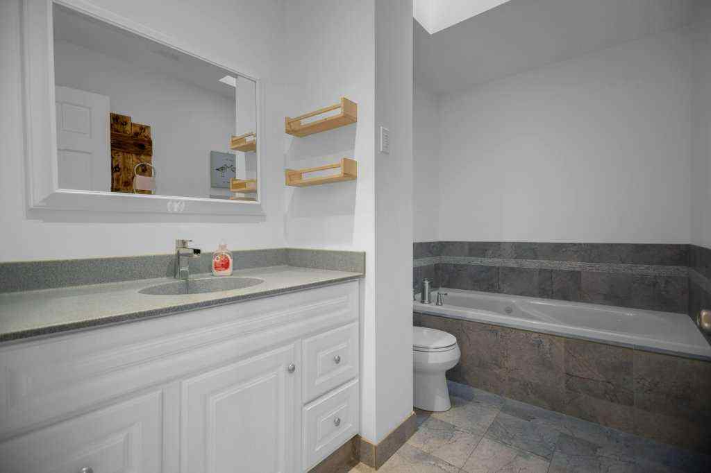 MLS® A2267691 - 164 Mckerrell Crescent SE in McKenzie Lake Calgary, Residential