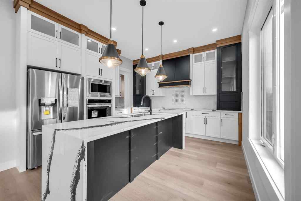 MLS® A2267708 - 327 Kinniburgh Place  in Kinniburgh North Chestermere, Residential