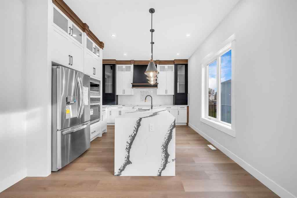 MLS® A2267708 - 327 Kinniburgh Place  in Kinniburgh North Chestermere, Residential