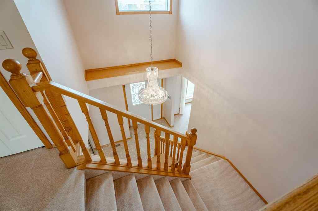 MLS® A2267736 - 301 Riverview Green  in Riverview Cochrane, Residential