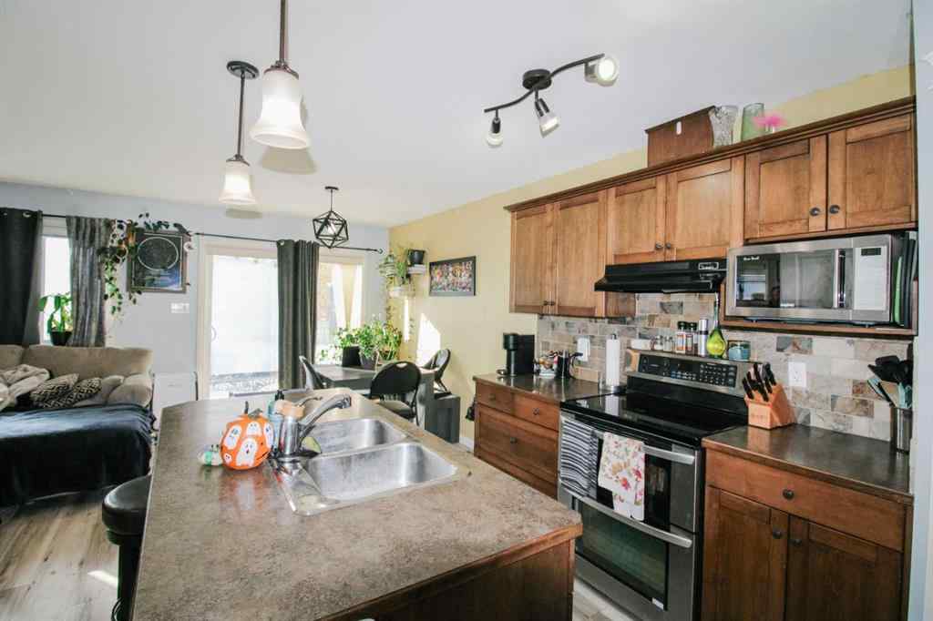 MLS® A2267741 - 701 Silkstone Close W in Copperwood Lethbridge, Residential