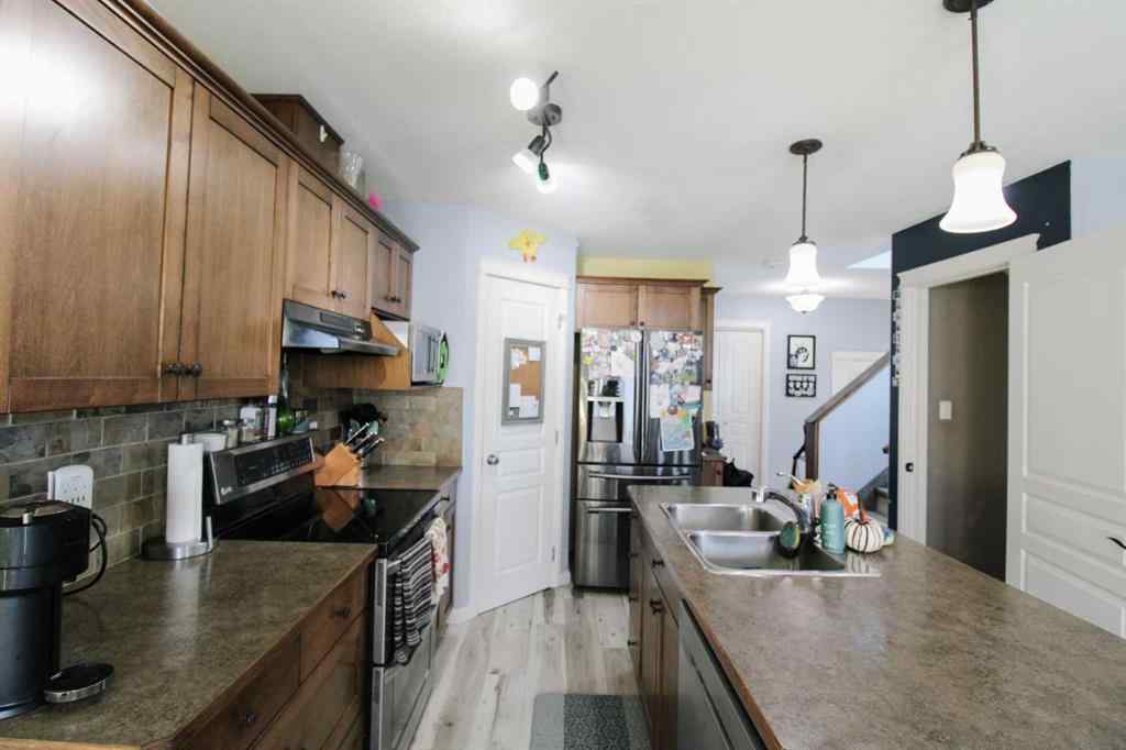 MLS® A2267741 - 701 Silkstone Close W in Copperwood Lethbridge, Residential