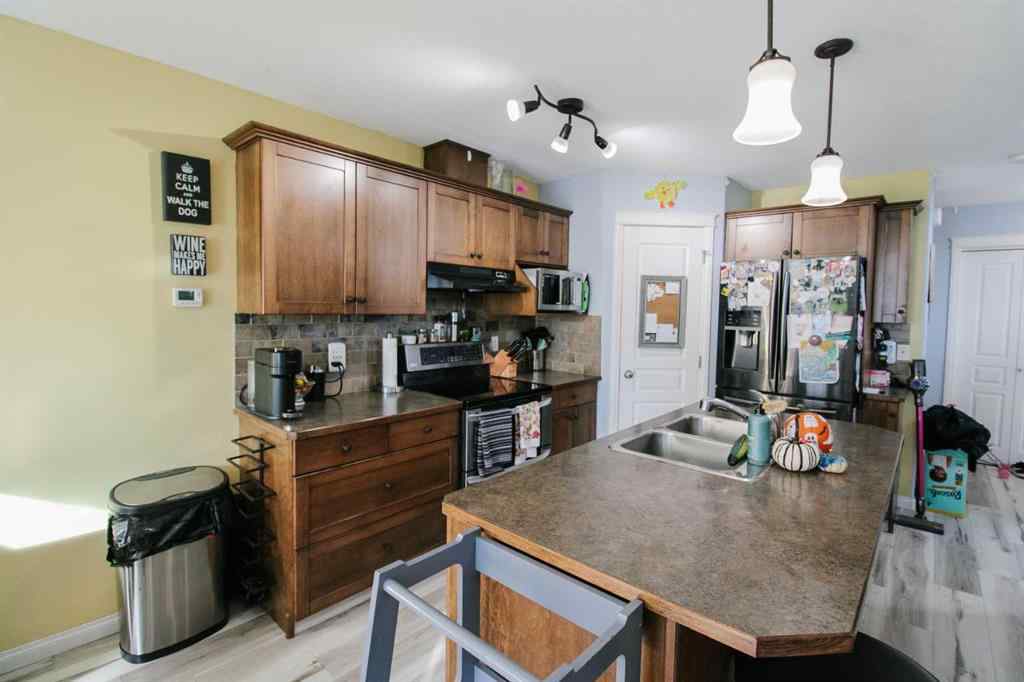 MLS® A2267741 - 701 Silkstone Close W in Copperwood Lethbridge, Residential