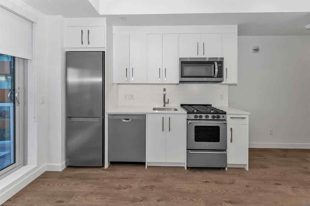 MLS® A2267745 - Unit #305 110 18A Street NW in West Hillhurst Calgary, Residential