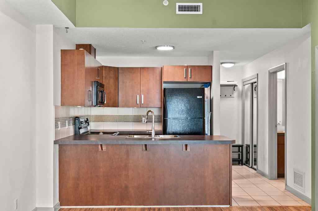 MLS&reg; # A2267764 - Unit #202 210 15 Avenue SE in Beltline Calgary, Residential Open Houses