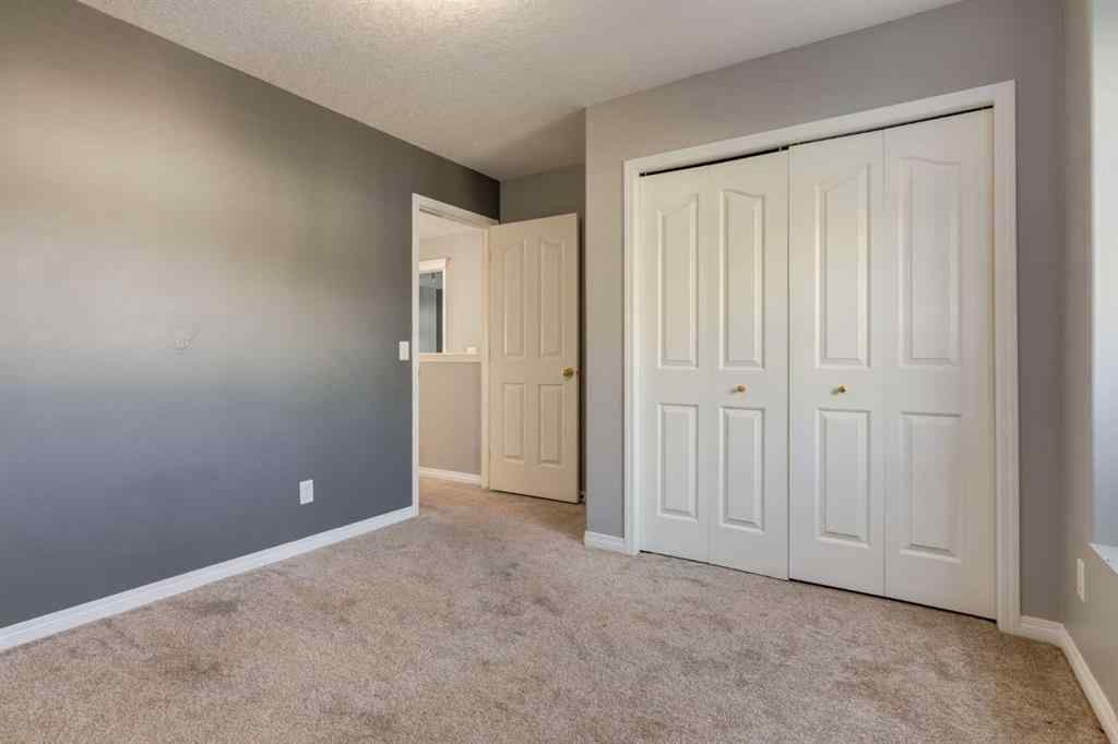 MLS® A2267778 - Unit #5 135 Bow Ridge Drive  in Bow Ridge Cochrane, Residential