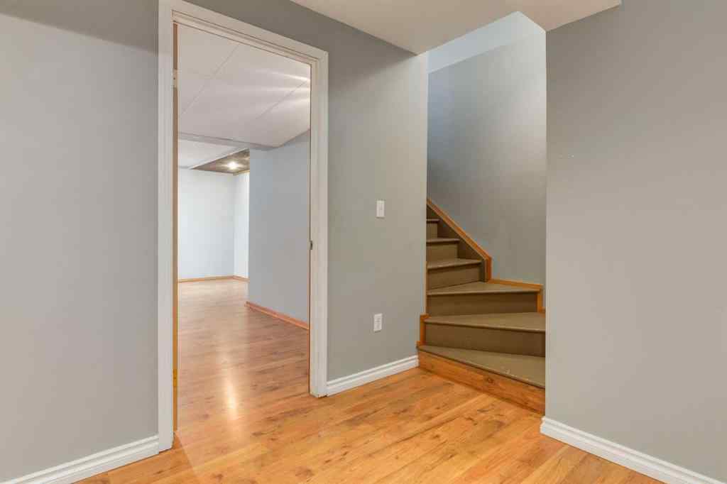 MLS® A2267778 - Unit #5 135 Bow Ridge Drive  in Bow Ridge Cochrane, Residential