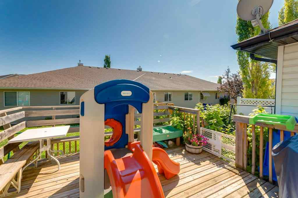 MLS® A2267778 - Unit #5 135 Bow Ridge Drive  in Bow Ridge Cochrane, Residential