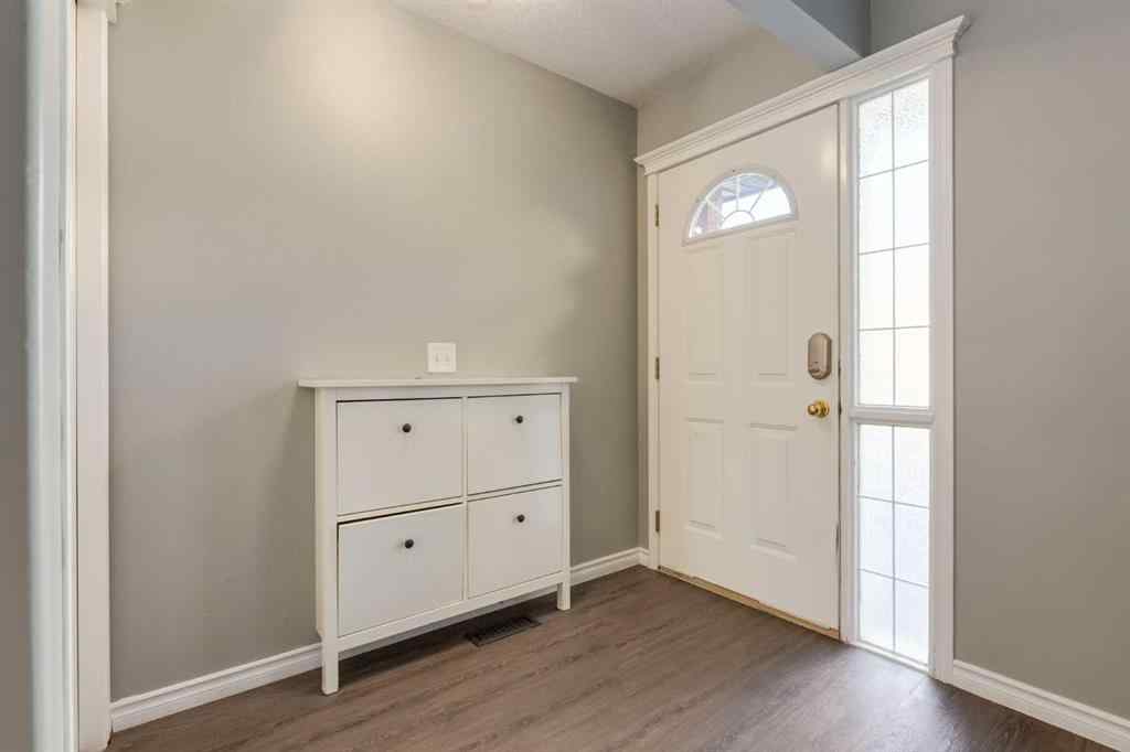 MLS® A2267778 - Unit #5 135 Bow Ridge Drive  in Bow Ridge Cochrane, Residential