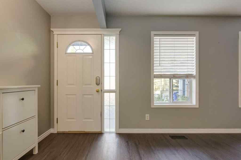 MLS® A2267778 - Unit #5 135 Bow Ridge Drive  in Bow Ridge Cochrane, Residential