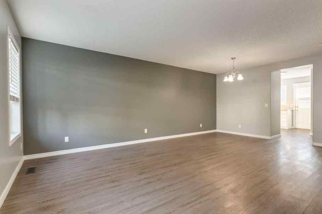 MLS® A2267778 - Unit #5 135 Bow Ridge Drive  in Bow Ridge Cochrane, Residential