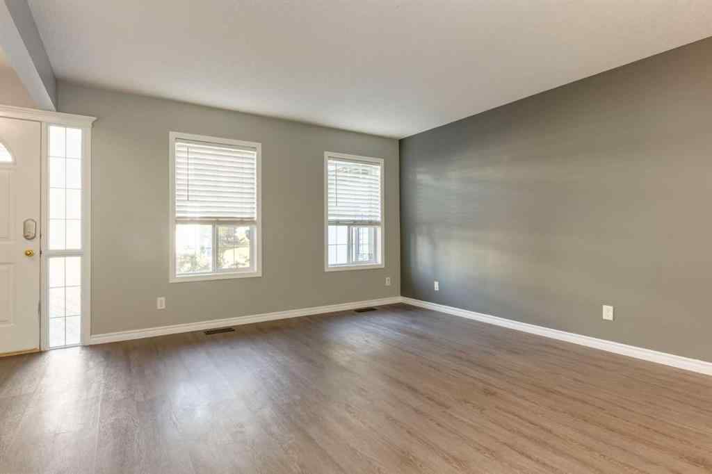 MLS® A2267778 - Unit #5 135 Bow Ridge Drive  in Bow Ridge Cochrane, Residential