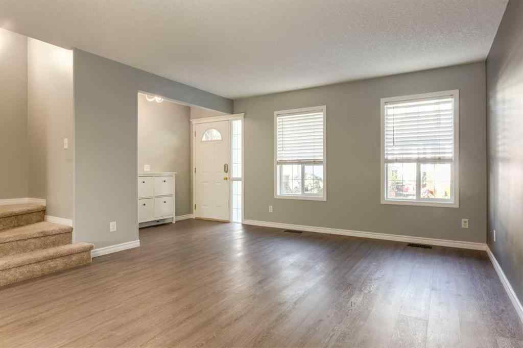 MLS® A2267778 - Unit #5 135 Bow Ridge Drive  in Bow Ridge Cochrane, Residential