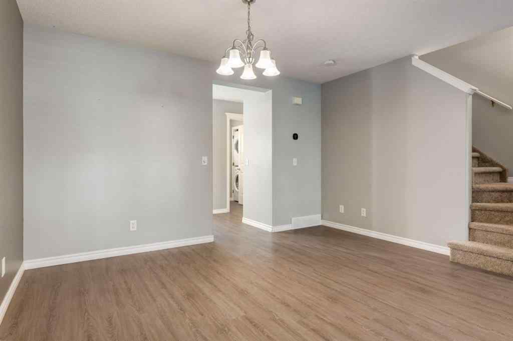 MLS® A2267778 - Unit #5 135 Bow Ridge Drive  in Bow Ridge Cochrane, Residential