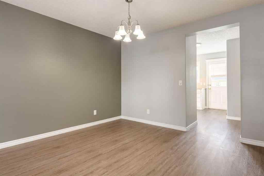 MLS® A2267778 - Unit #5 135 Bow Ridge Drive  in Bow Ridge Cochrane, Residential